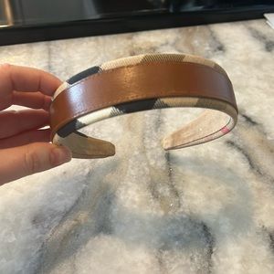 Gently used Burberry leather and fabric headband. GREAT condition.